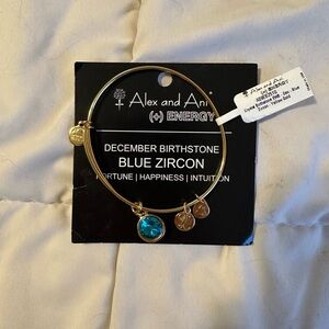 Alex and Ani Gold Bangle with Blue Charm